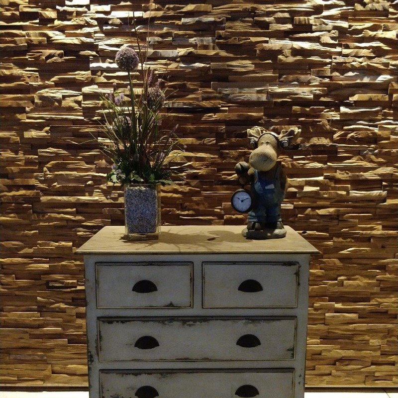 Teak Axewood wall cladding in interior setting