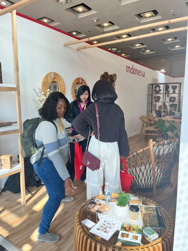 Visitors reading product catalogues at the Indonesia Pavilion, Decorex Johannesburg 2026